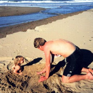 Emma & Cavan playing mermaid on the main beach